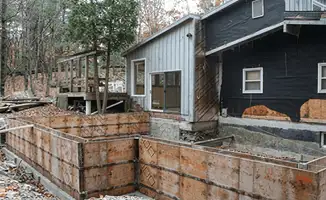 Prepared site with foundation forms for home remodeling and addition project in Rochester, NY
